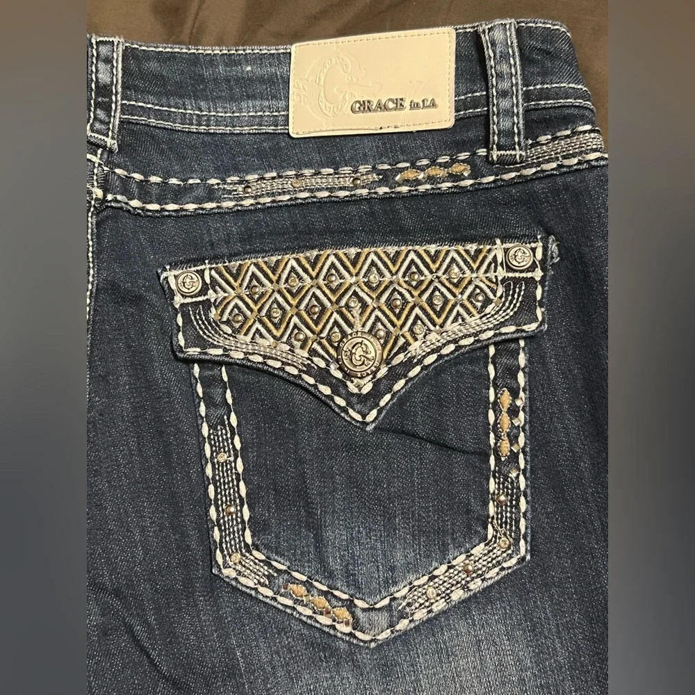 Grace in LA Dark Indigo Boot Cut Jeans with Tan & White Stitching - Picture 1 of 4